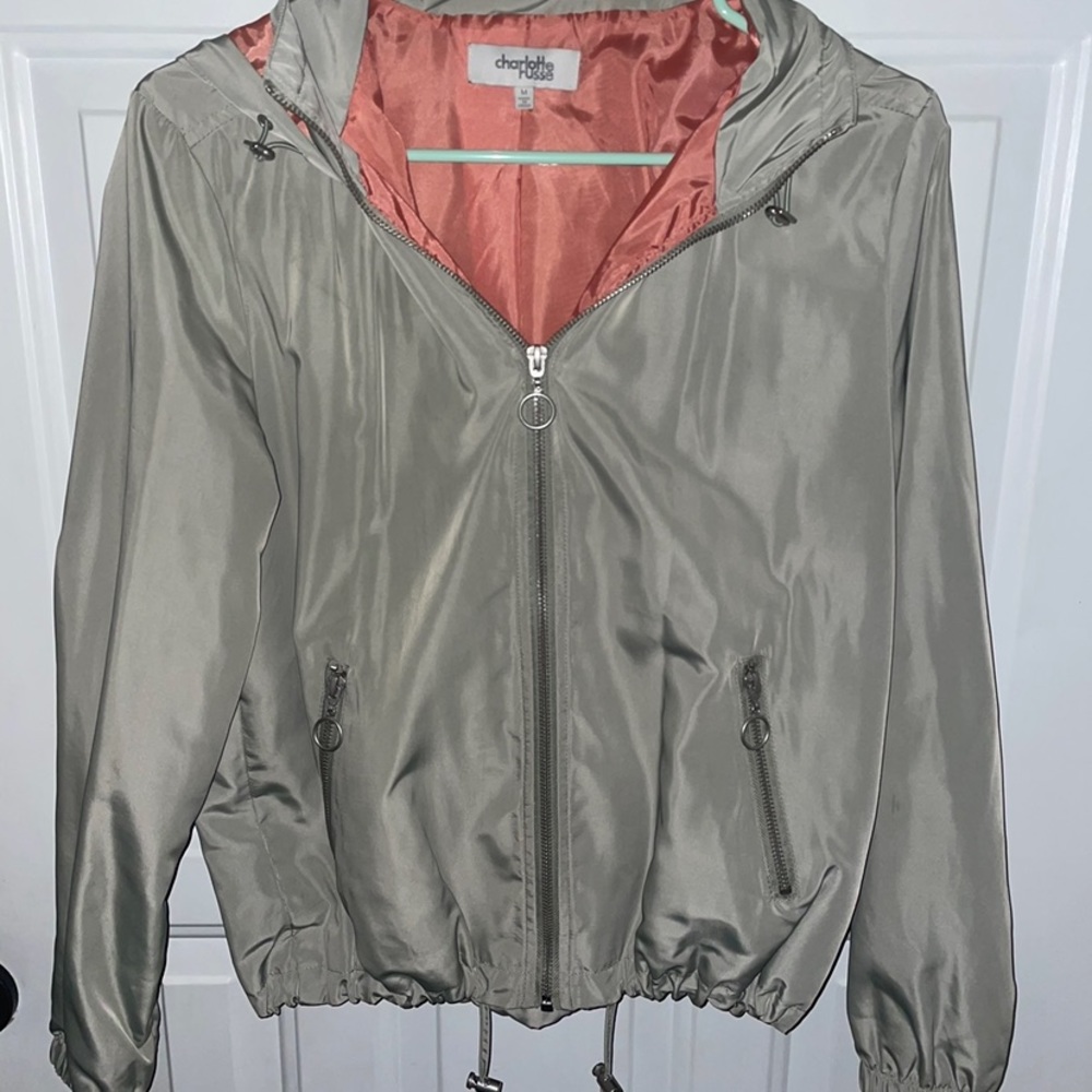 Navy/light green windbreaker. Size medium